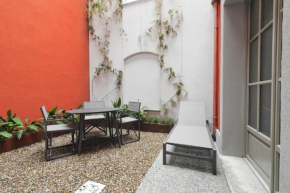 Boutique apartment with private parking and gym